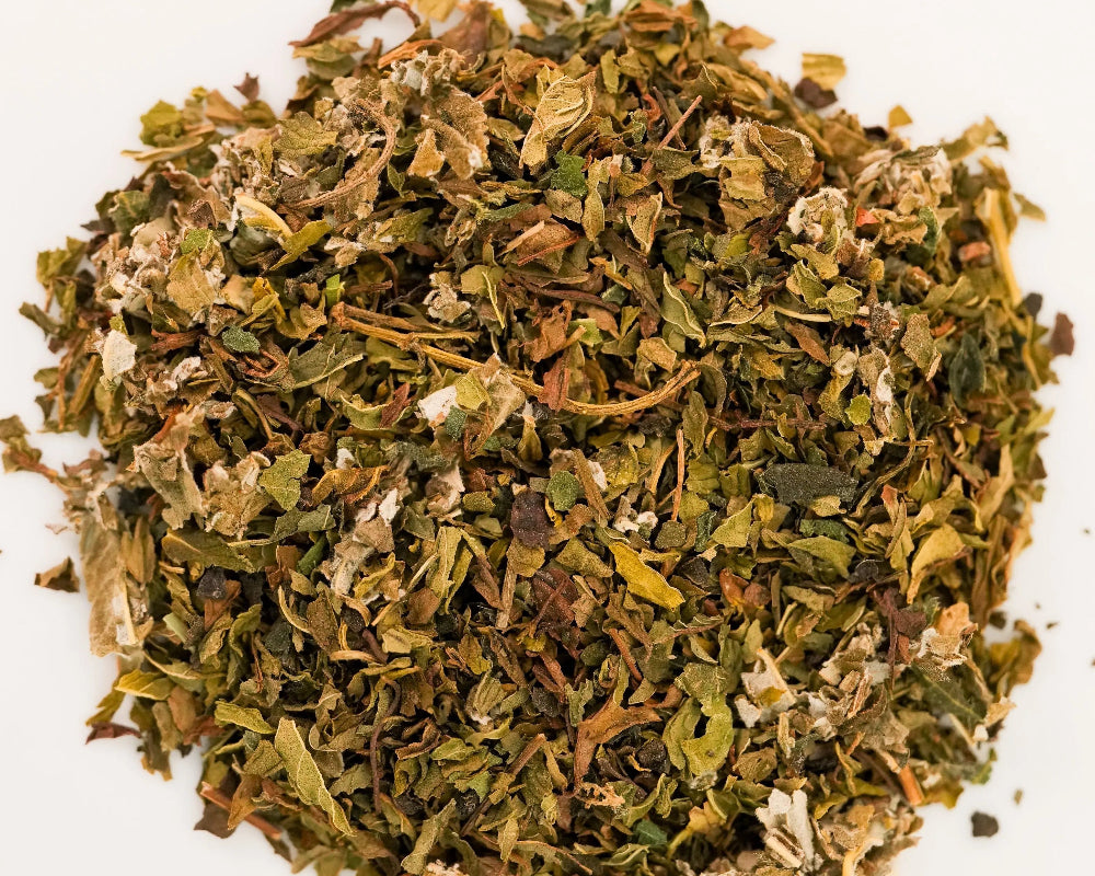 Loose-leaf Otteane nourishing mint tea blend with nettle, red raspberry leaf, and spearmint. Happyness Tea Company