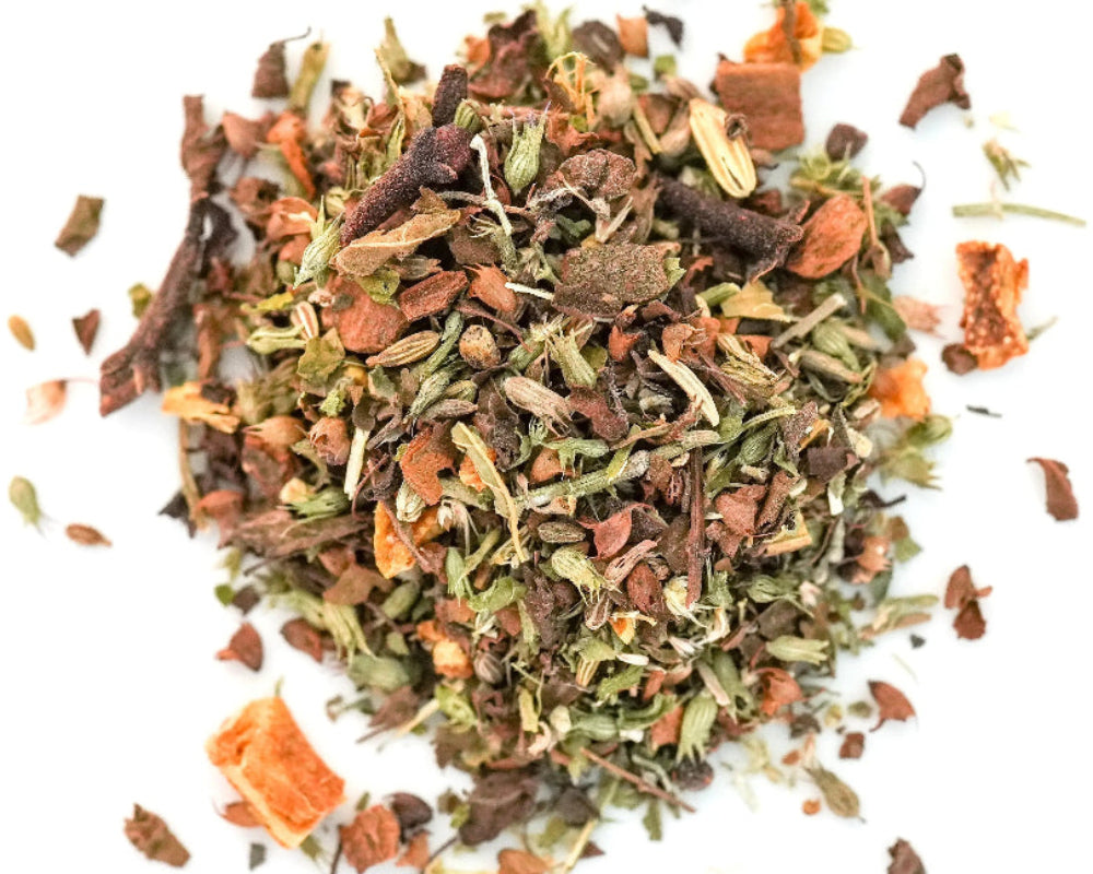 Loose-leaf Sweet Surrender spiced nighttime tea with tulsi, catnip, licorice root, orange peel, cardamom, anise, and cloves.
