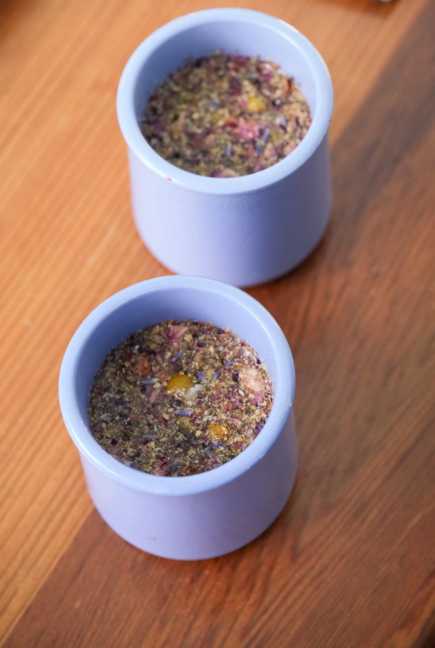 Tea tasting experience setup with cups,  and loose-leaf tea