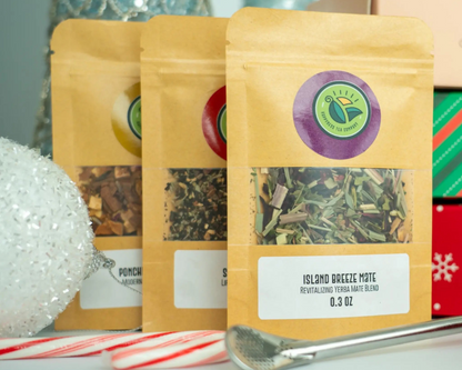 Tea sampler box featuring an assortment of four loose-leaf teas in individual packages.